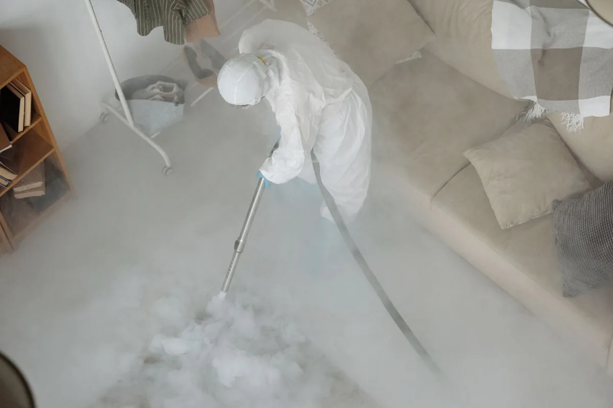 Biohazard cleanup technician in protective equipment, Osino, NV